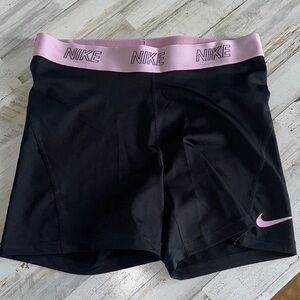 Nike Women's Athletic Shorts in Black with Pink Trim